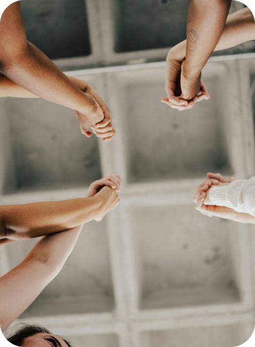 Hands reaching together